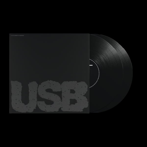 Black vinyl record with a textured cover displaying 'USB' on a white background