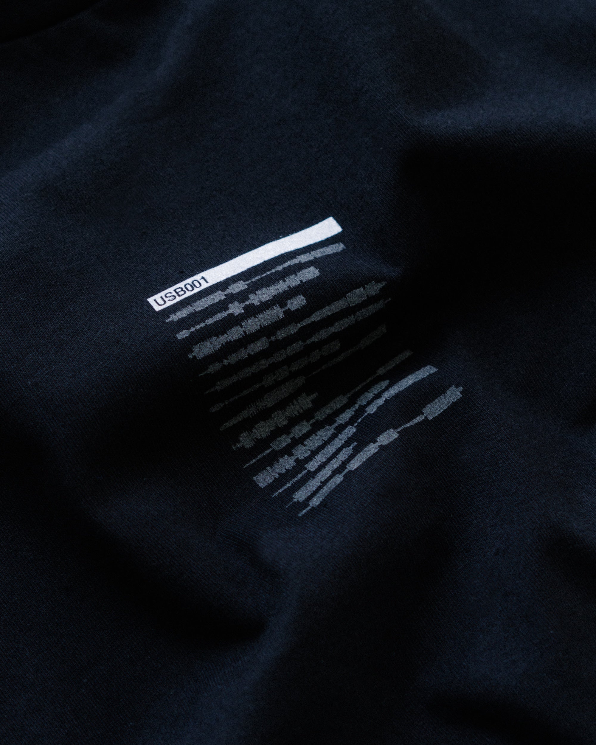 usb reflective black tee – Fred again.. US